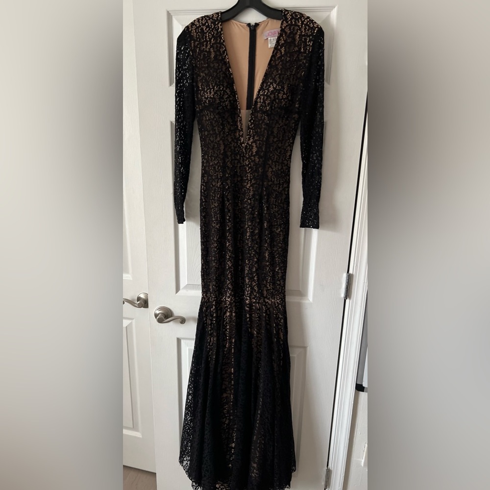 Jovani black with nude underlay long sleeve laced evening gown size 0